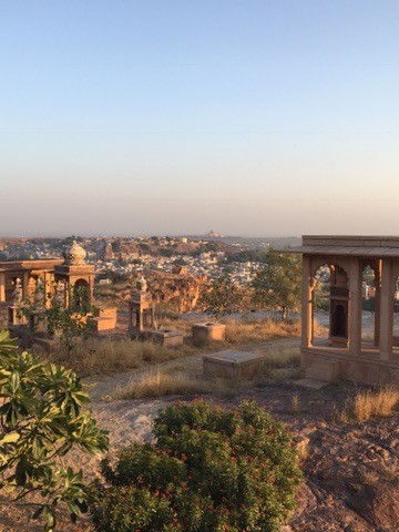 A hillside view across a city of stone buildings
